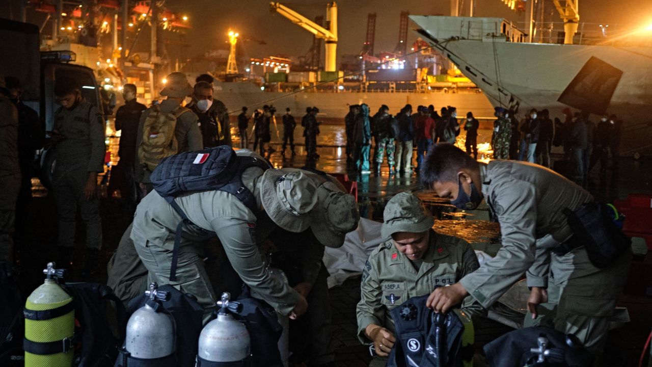 Indonesian Navy divers check their equipment before a search and rescue operation for Sriwijaya Air Flight 182, which lost contact with air controllers shortly after takeoff on Saturday.