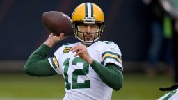 CHICAGO, ILLINOIS - JANUARY 03: Aaron Rodgers #12 of the Green Bay Packers warms up prior to the game against the Chicago Bears at Soldier Field on January 03, 2021 in Chicago, Illinois. (Photo by Quinn Harris/Getty Images)