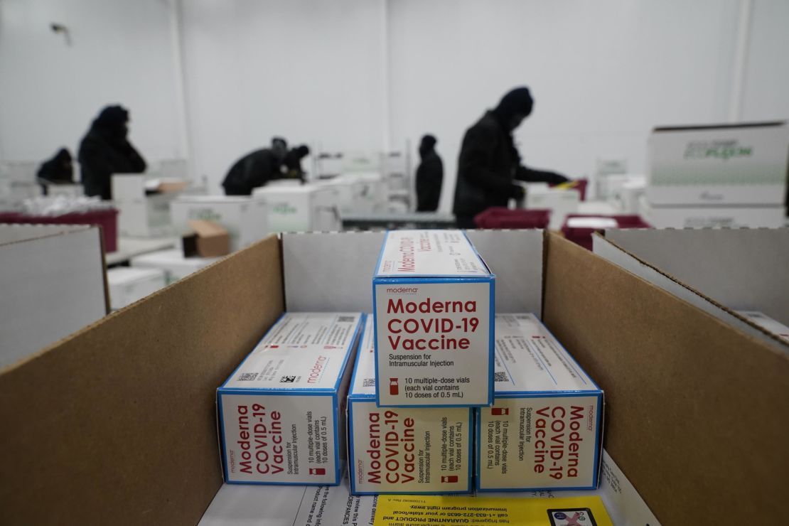 Boxes containing the Moderna vaccine are prepared to be shipped at the McKesson distribution center in Olive Branch, Mississippi on December 20.