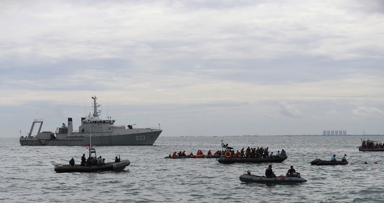 Indonesian Navy divers take part in a search operation near Jakarta.