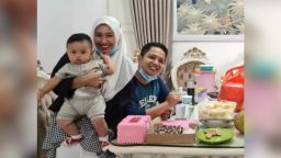 Rizki Wahyudi, 26, and his wife Indah Halimah Putri, 26, with their 7 month old son, Arkana Nadhif Wahyudi.
Husband Rizki Wahyudi, 26, and wife Indah Halimah Putri, 26, posing with their 7-month-old son Arkana Nadhif Wahyudi. Not pictured is Rosi Wahyuni (Rizki's mother) and Nabila Anjani (Rizki's cousin), who are also missing after the crash.