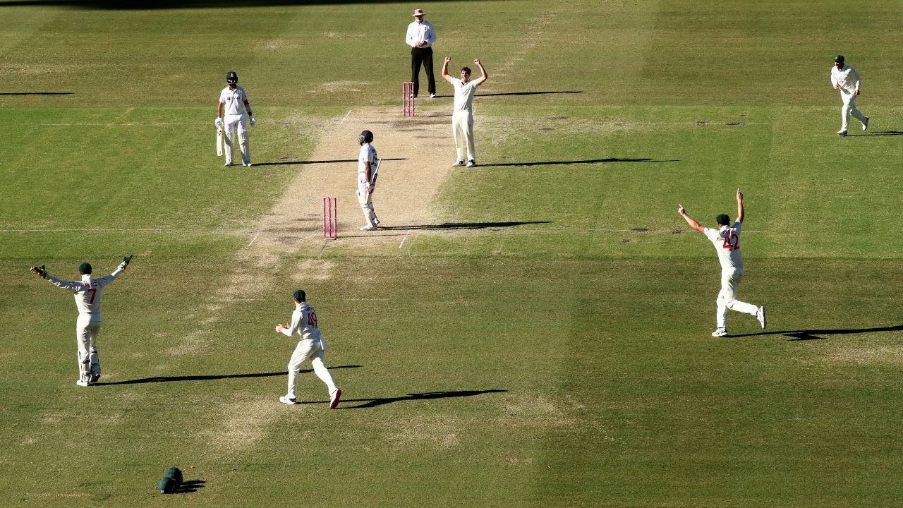 Pat Cummins of Australia celebrates dismissing Rohit Sharma of India during day four of the third Test match in the series between Australia and India at Sydney Cricket Ground on January 10, 2021.