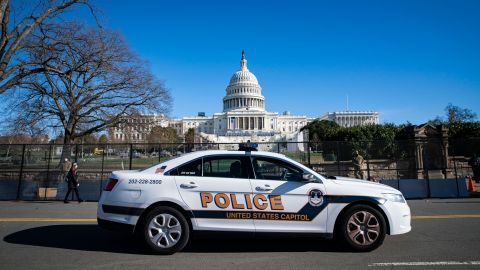 A US Capitol Police car drives past on patrol in front of security fencing near the West Front of the Capitol, on January 9, 2021, in Washington, DC. 