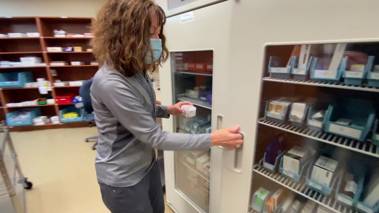 Doses of the vaccine are placed in a refrigerator in Thief River Falls, Minnesota.