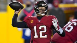 Tampa Bay Buccaneers quarterback Tom Brady (12) throws a pass during the second half of an NFL wild-card playoff football game against the Washington Football Team, Saturday, Jan. 9, 2021, in Landover, Md. (AP Photo/Julio Cortez)