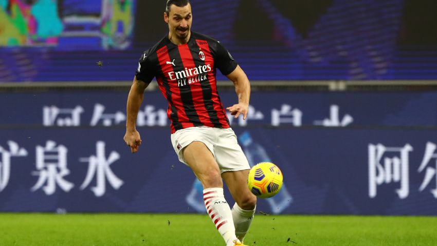 MILAN, ITALY - JANUARY 09: Zlatan Ibrahimovic of A.C. Milan passes the ball during the Serie A match between AC Milan and Torino FC at Stadio Giuseppe Meazza on January 09, 2021 in Milan, Italy. Sporting stadiums around Italy remain under strict restrictions due to the Coronavirus Pandemic as Government social distancing laws prohibit fans inside venues resulting in games being played behind closed doors. (Photo by Marco Luzzani/Getty Images)