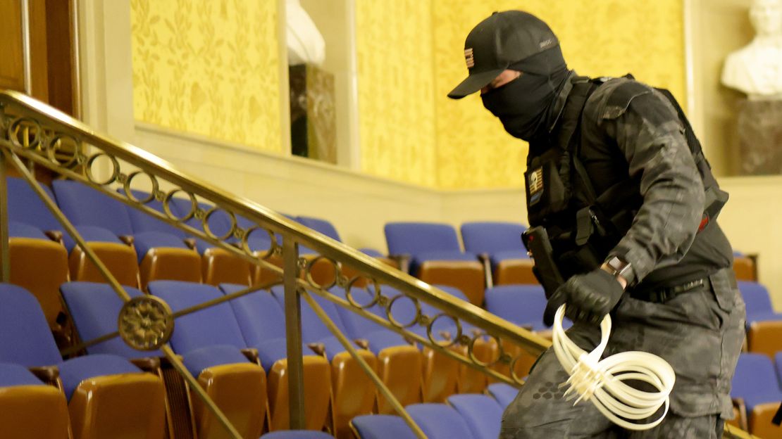 Authorities say they believe this photo shows Eric Munchel in the Senate chamber on January 6.
