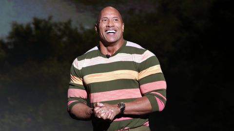 Dwayne Johnson, shown here at an event over the summer, is among the stars featured in a lineup of films releasing on Netflix in 2021. (Photo by Jesse Grant/Getty Images for Disney)