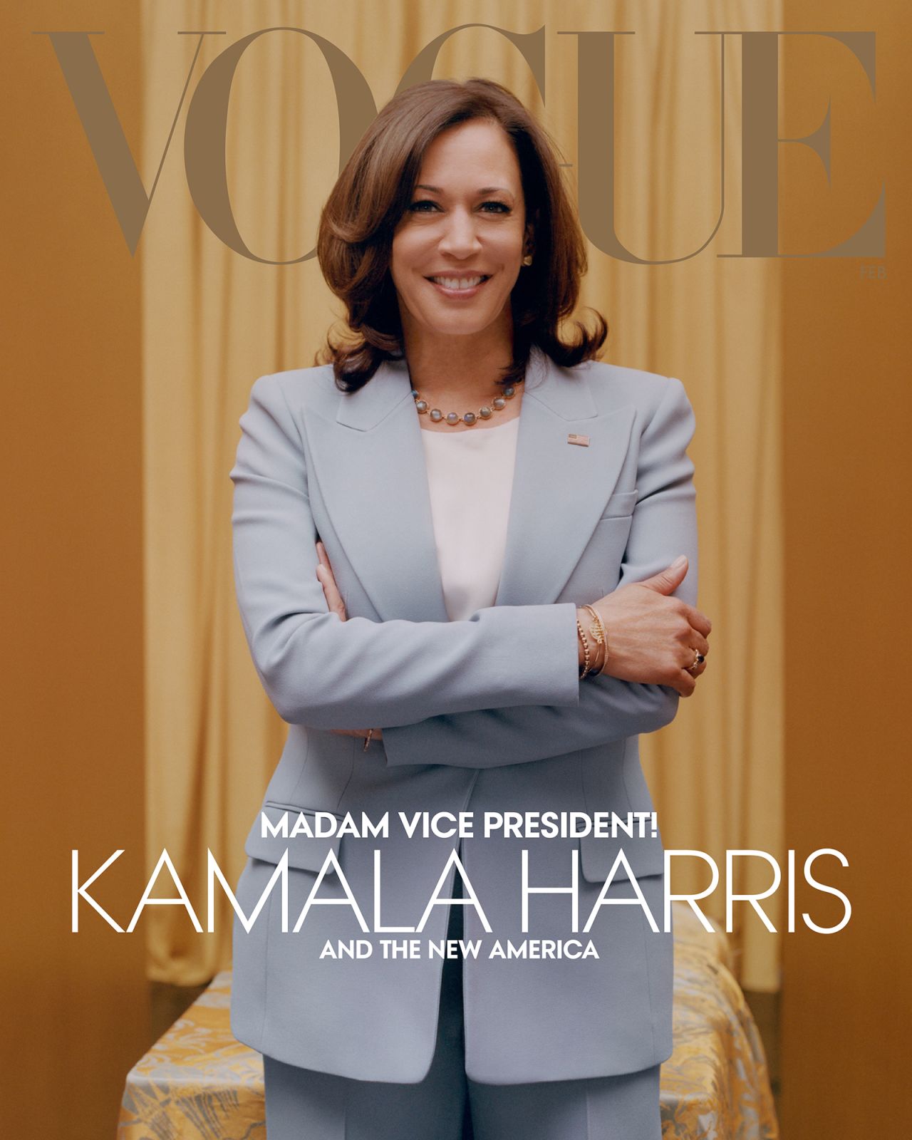 Vogue revealed a second "digital" cover featuring Harris in a blue suit.