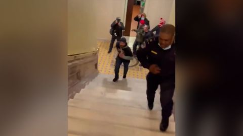Capitol Police Officer Eugene Goodman is seen herding protesters away from Senate Chambers on Wednesday, January 6, 2020.