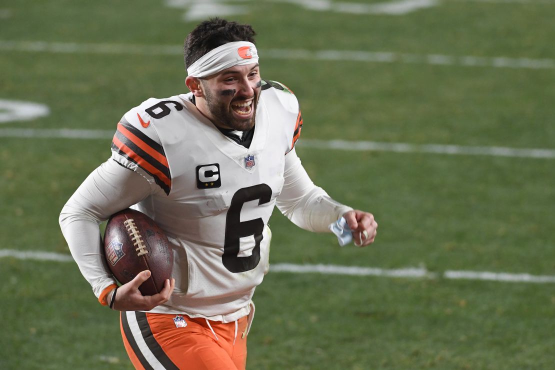 Mayfield celebrates as he runs off the field after defeating the Pittsburgh Steelers.