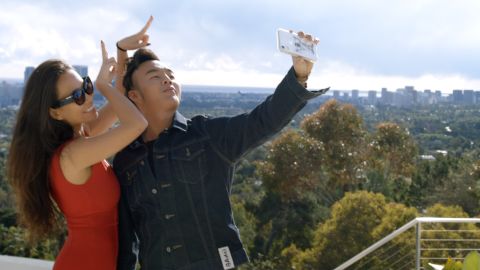 Kelly Mi Li (left) and Kane Lim (right) are shown in a scene from "Bling Empire."