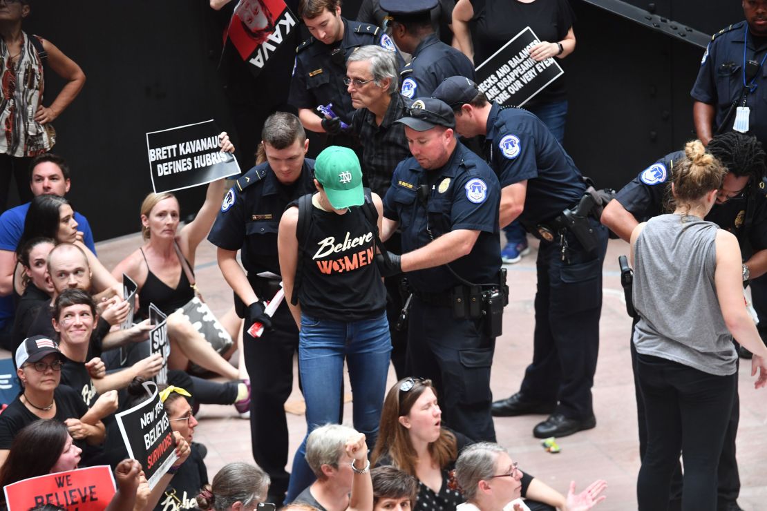 Capitol Police arrest demonstrators protesting US Supreme Court nominee Brett Kavanaugh.