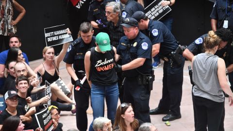Capitol Police arrest demonstrators protesting US Supreme Court nominee Brett Kavanaugh.