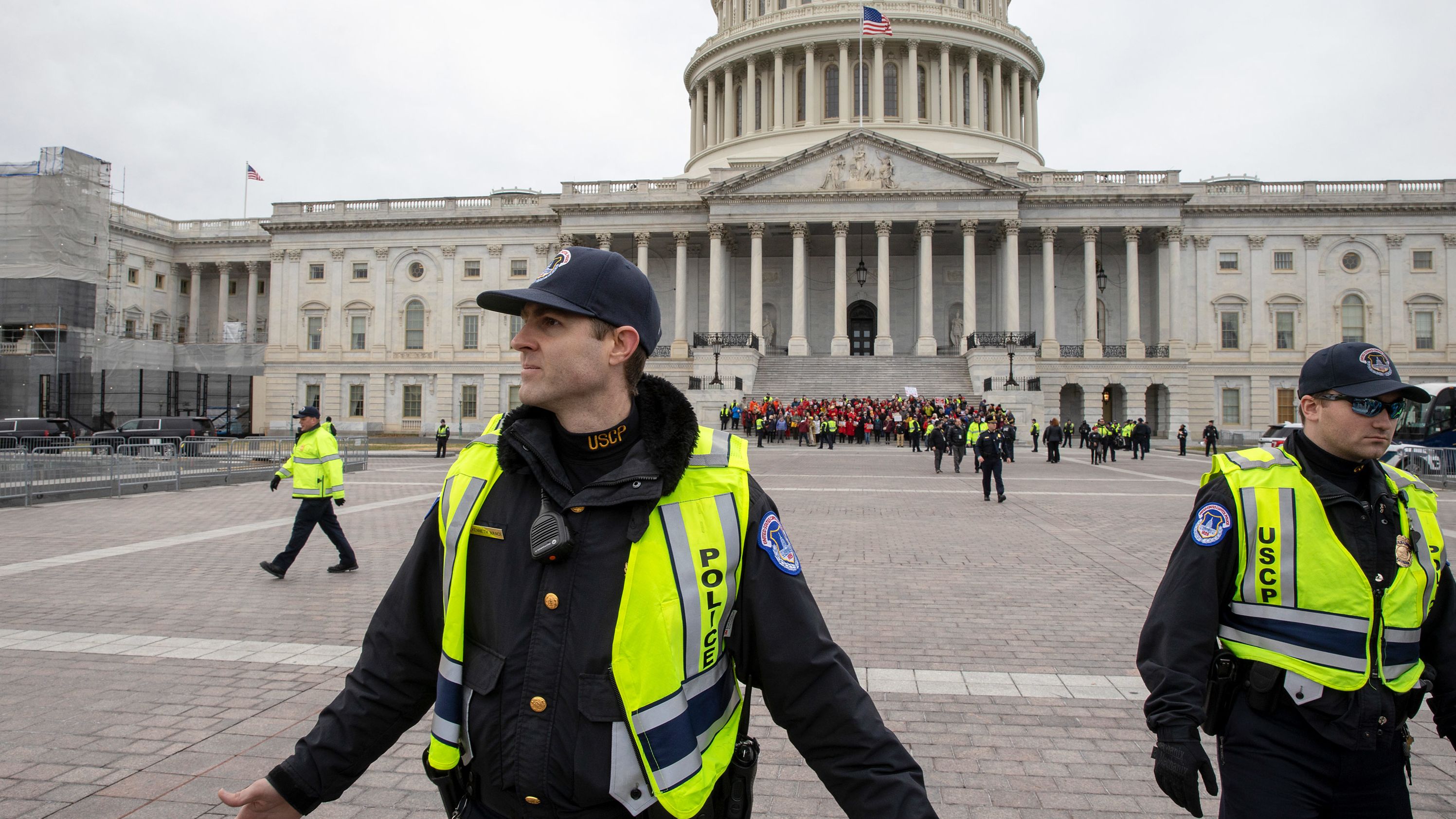 Police move back protesters at a climate change demonstration on Capitol Hill.