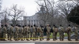 Members of the National Guard line up near the U.S. Capitol building in Washington, D.C., U.S., on Monday, Jan. 11, 2021. 