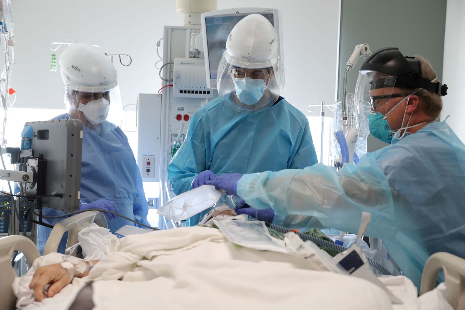 Dr. Dan Ponticiello and Dr. Gabriel Gomez intubate a coronavirus patient at a hospital in Mission Viejo, California, on January 8.