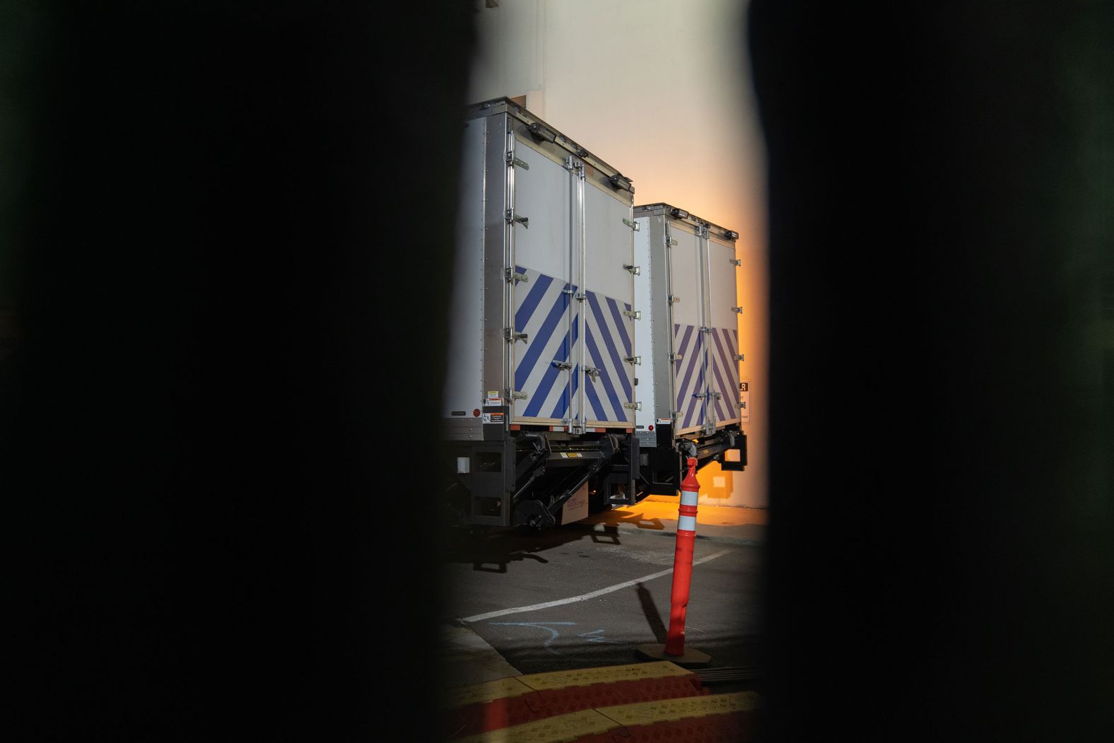 Refrigerated morgue trailers sit outside the office of the Los Angeles County coroner on January 6.