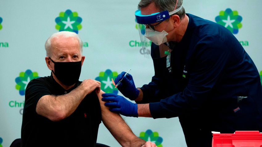 US President-elect Joe Biden receives the second course of the Pfizer-BioNTech Covid-19 vaccine at Christiana Hospital in Newark, Delaware, on January 11, 2021 administered by Chief Nurse Executive Ric Cuming. (Photo by JIM WATSON / AFP) (Photo by JIM WATSON/AFP via Getty Images)