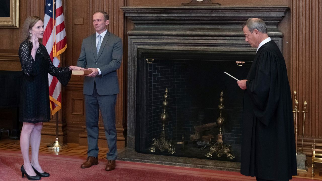 Chief Justice John G. Roberts administers the Judicial Oath to U.S. Supreme Court Associate Justice Amy Coney Barrett on October 27, 2020 in Washington, DC. 