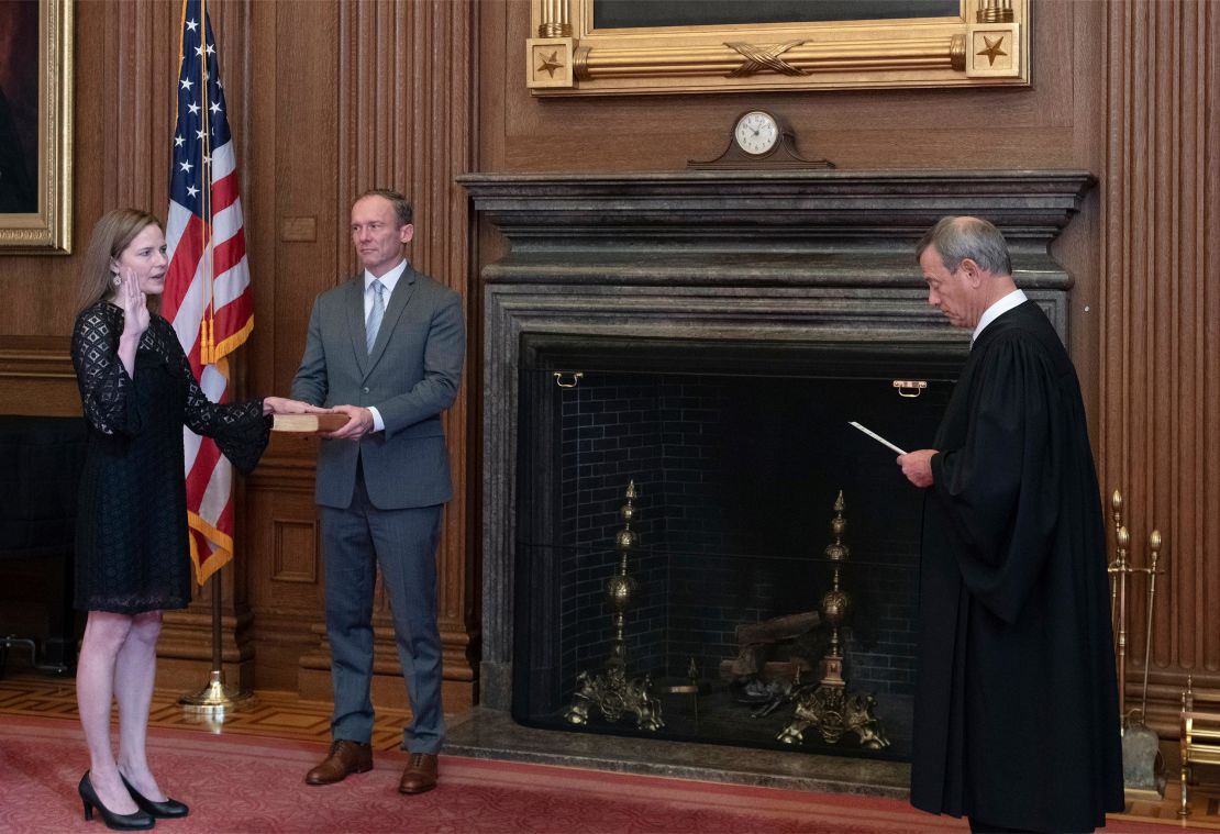 Chief Justice John G. Roberts administers the Judicial Oath to U.S. Supreme Court Associate Justice Amy Coney Barrett on October 27, 2020 in Washington, DC. 