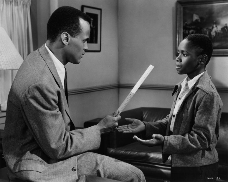 Belafonte, left, plays a school principal in a scene from the film "See How They Run" in 1952. Appearing with Belafonte in the scene is Philip Hepburn.