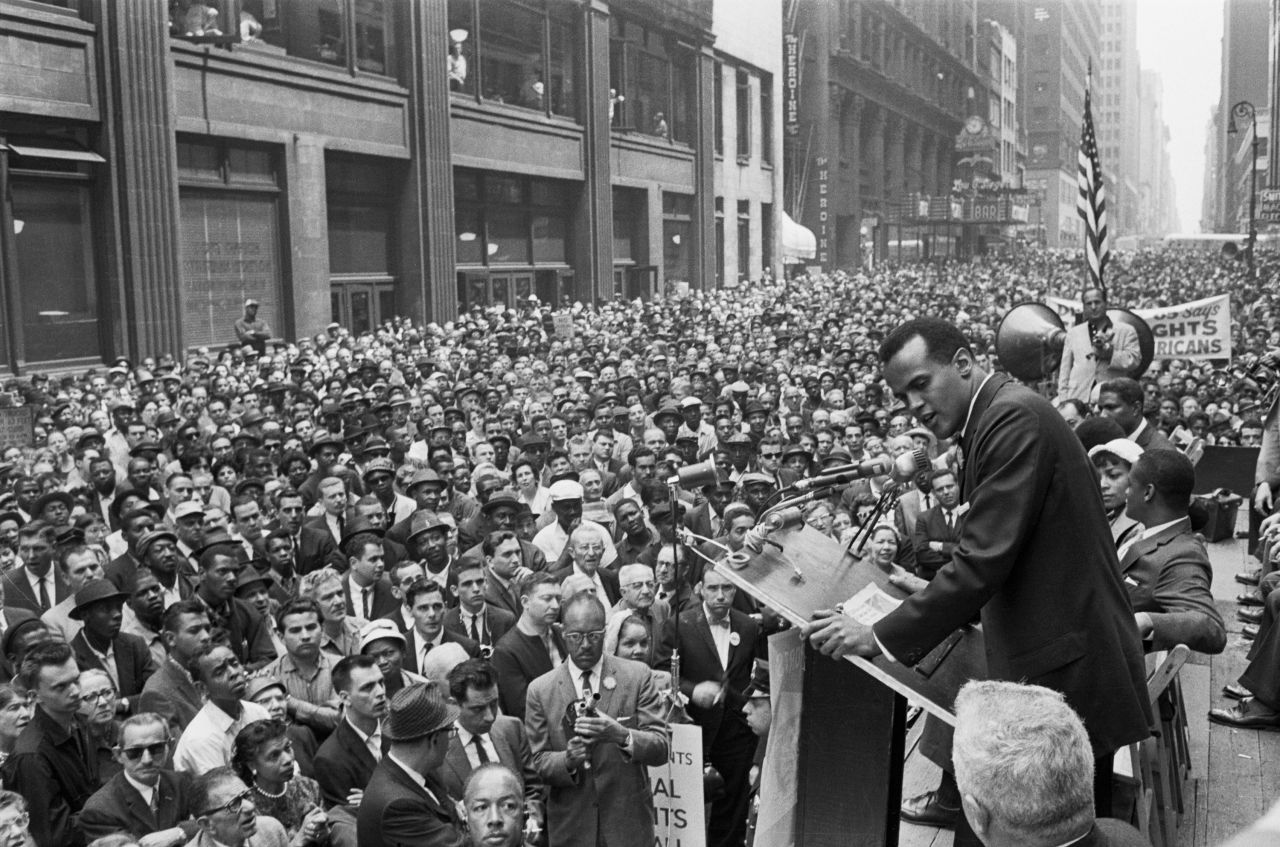 A crowd gathers in New York as Belafonte sings at a civil rights rally in 1960.