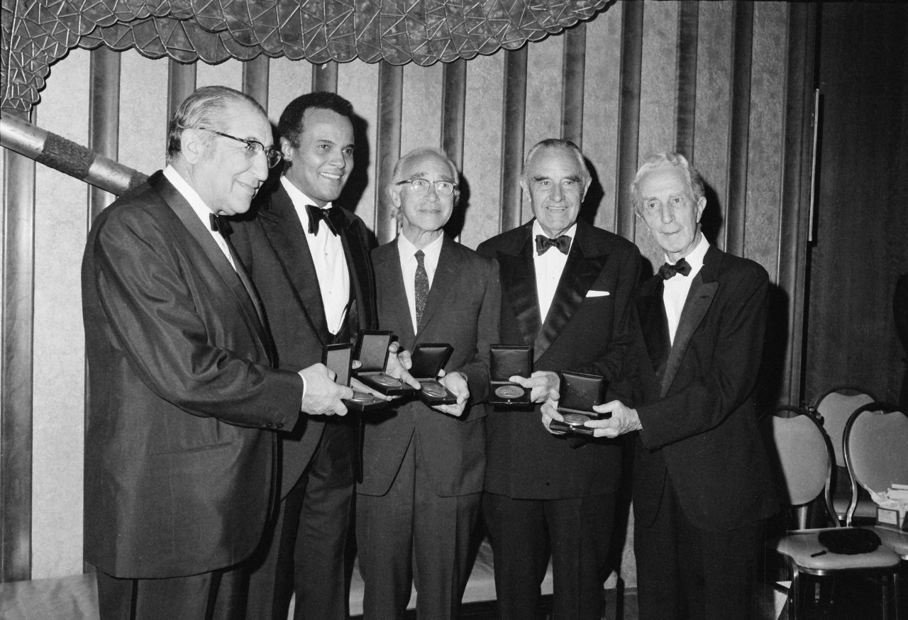 Belafonte and other recipients of Albert Einstein Commemorative Awards display their medallions after being honored in 1972. From left are Max M. Fisher, Belafonte, Dr. George Wald, W. Averell Harriman and Norman Rockwell.