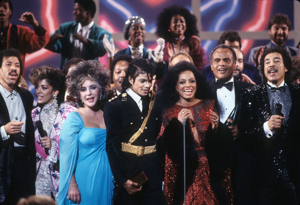 Belafonte, second from right, appears with other superstars at the American Music Awards in 1986. Belafonte helped organize the making of the hit single "We Are the World," which brought together leading artists such as Michael Jackson, Lionel Richie and Diana Ross to help raise money for Africa famine relief.