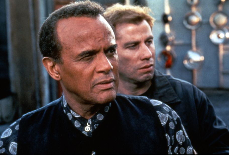 Belafonte and John Travolta star in "White Man's Burden" in 1995.