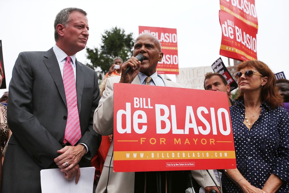 Belafonte speaks at a rally in New York calling for quality health care in 2013. Next to him is then-mayoral candidate Bill de Blasio and actress Susan Sarandon.