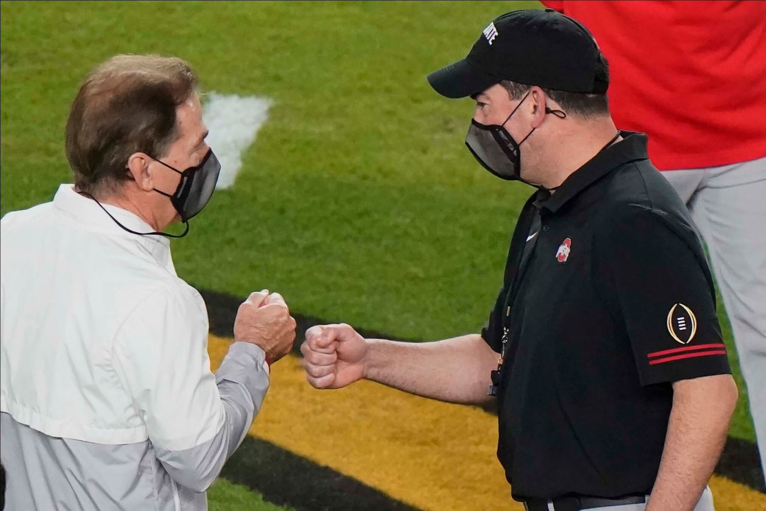 Saban, left, greets Ohio State head coach Ryan Day before kickoff. This was Day's second full season as head coach of the Buckeyes.