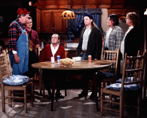 Newhart, seated, appears in a scene of the TV sitcom "Newhart" in 1982. He played the role of Vermont innkeeper Dick Loudon, who tried to maintain his sanity while surrounded by comical locals.