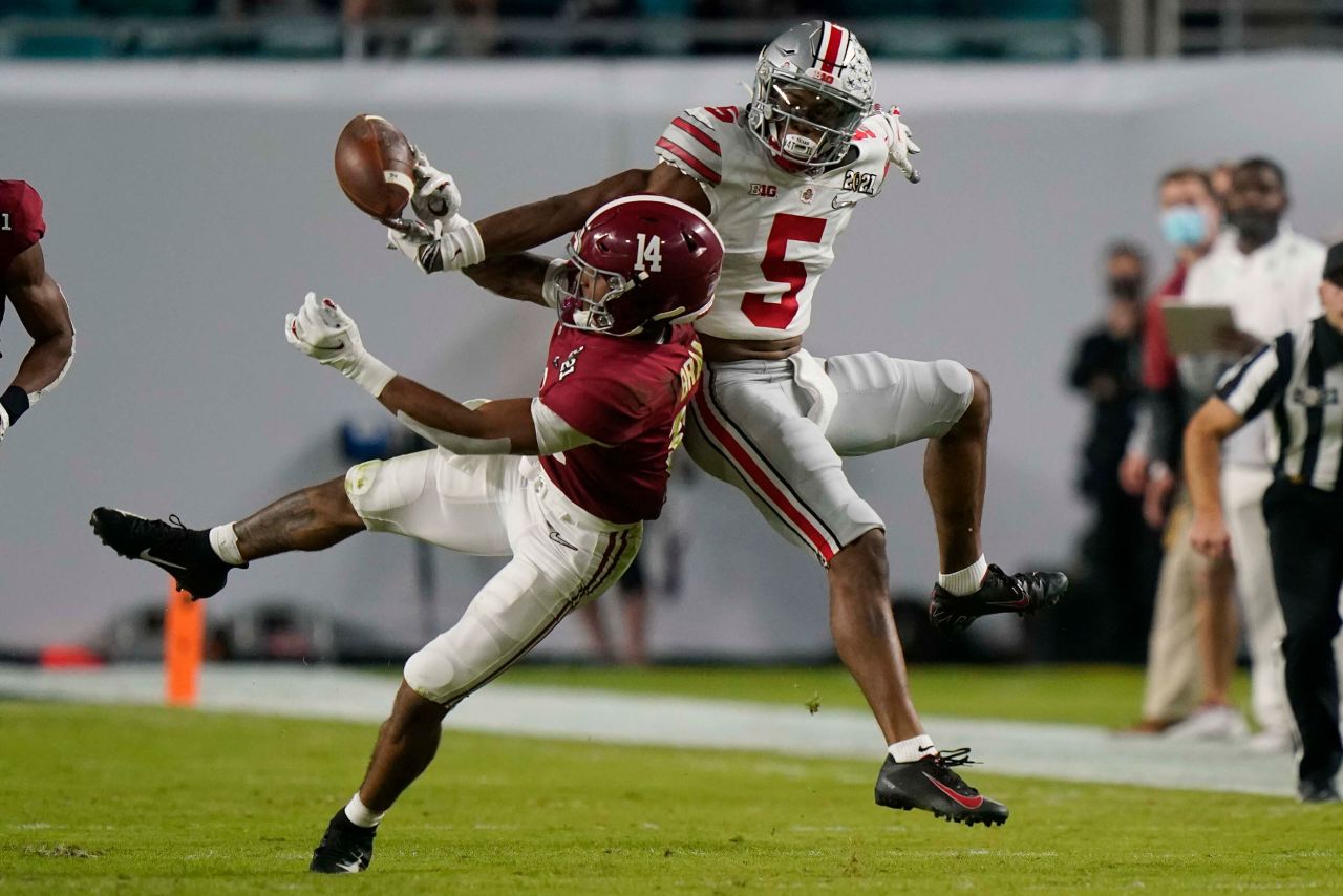 Alabama defensive back Brian Branch breaks up a pass intended for Javon Baker.