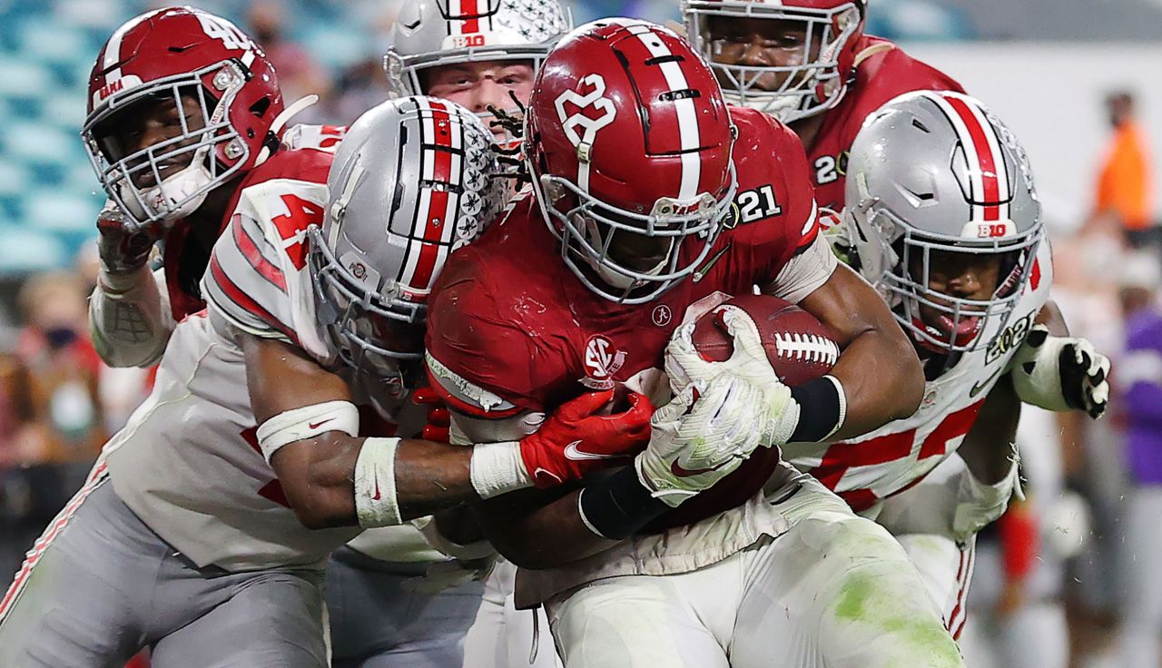 Alabama running back Najee Harris carries the ball during the fourth quarter.