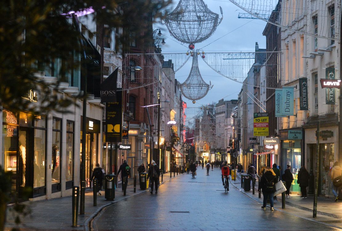 People walk down Grafton Street in Dublin city center on January 6 after lockdown measures were reimposed.