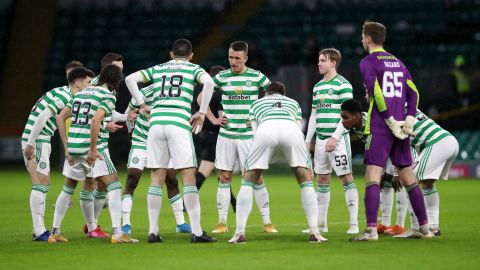 Celtic players huddle ahead of their match against Hibernian.