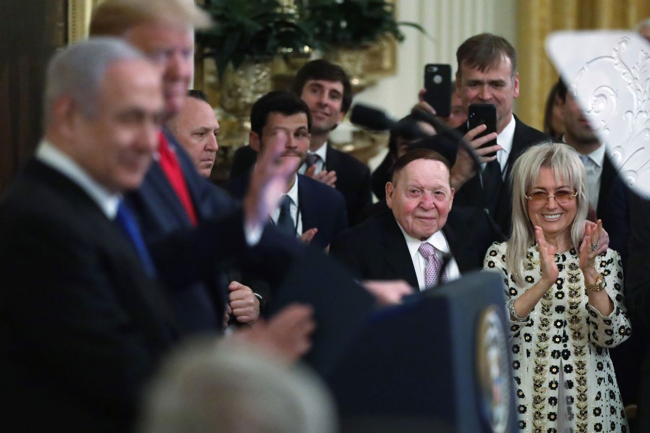 The Adelsons attend a White House event with Trump and Israeli Prime Minister Benjamin Netanyahu in 2020.