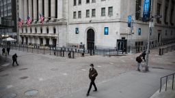 Pedestrians walk in front of the New York Stock Exchange NYSE, in New York, United States, Jan. 8, 2021. U.S. employers slashed 140,000 jobs in December, the first monthly decline since April 2020, as the recent COVID-19 spikes disrupted labor market recovery, the Labor Department reported Friday. 
The unemployment rate, which has been trending down over the past seven months, remained unchanged at 6.7 percent, according to the monthly employment report. (Photo by Michael Nagle/Xinhua/Getty Images)