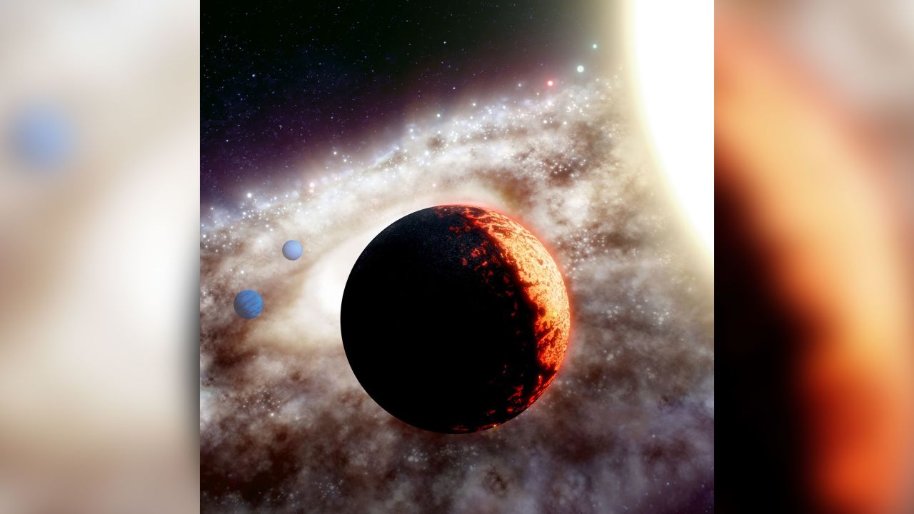 This artist's illustration shows TOI-561b, one of the oldest and most metal-poor planetary systems discovered yet in the Milky Way galaxy. Astronomers found a super-Earth and two other planets orbiting the star.