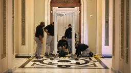 WASHINGTON, DC - JANUARY 12: U.S. Capitol Police install a metal detector outside the House of Representatives Chamber, on the very spot where less than a week earlier violent insurrectionists attempted to smash their way through and halt the certification of the Electoral College votes, January 12, 2021 in Washington, DC. At the direction of President Donald Trump, the mob attacked the U.S. Capitol on January 6 and security has been tightened ahead of next week's presidential inauguration. (Photo by Chip Somodevilla/Getty Images)