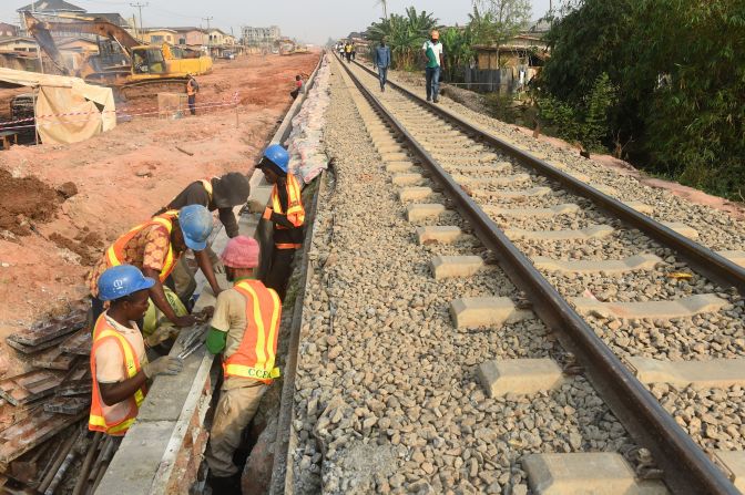 <strong>New rail line to connect Nigeria -- </strong>Another ambitious railway project, the <a href="index.php?page=&url=https%3A%2F%2Fconstructionreviewonline.com%2Fproject-timelines%2Flagos-kano-sgr-project-timeline-and-what-you-need-to-know%2F" target="_blank" target="_blank">Lagos-Kano Standard Gauge Railway</a>, in Nigeria, will span 1,678 miles (2,700 kilometers) from the port city of Lagos, to the northern city of Kano, near the border with Niger. Intended to boost the economy, the railway will carry both passengers and freight. Built by China Civil Engineering Construction Company (CCECC) and partially funded by Exim Bank, the project is being completed in multiple stages: the first section between Abuja and Kaduna was completed in 2016, while the second Lagos to Ibadan section began trials in <a href="index.php?page=&url=https%3A%2F%2Fwww.railjournal.com%2Fafrica%2Fnigeria-begins-trials-on-lagos-ibadan-line%2F" target="_blank" target="_blank">December 2020</a>. 