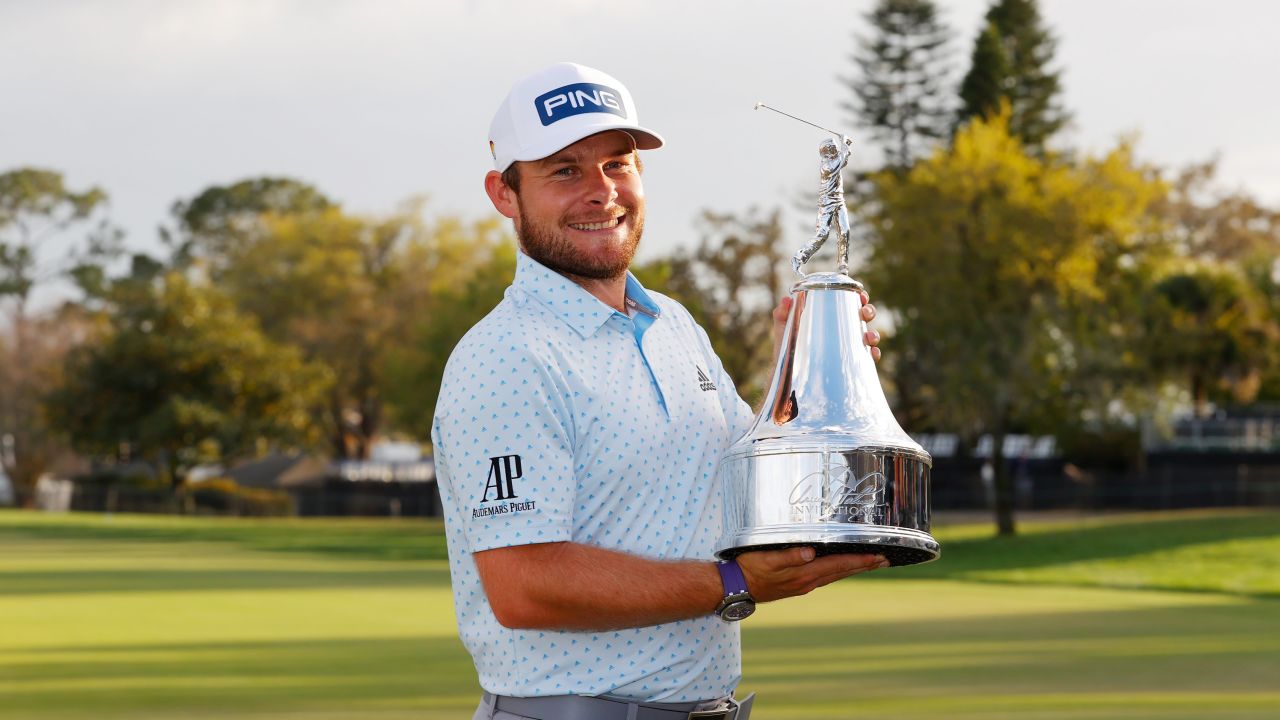 Tyrrell Hatton celebrates after winning the Arnold Palmer Invitational at Bay Hill.