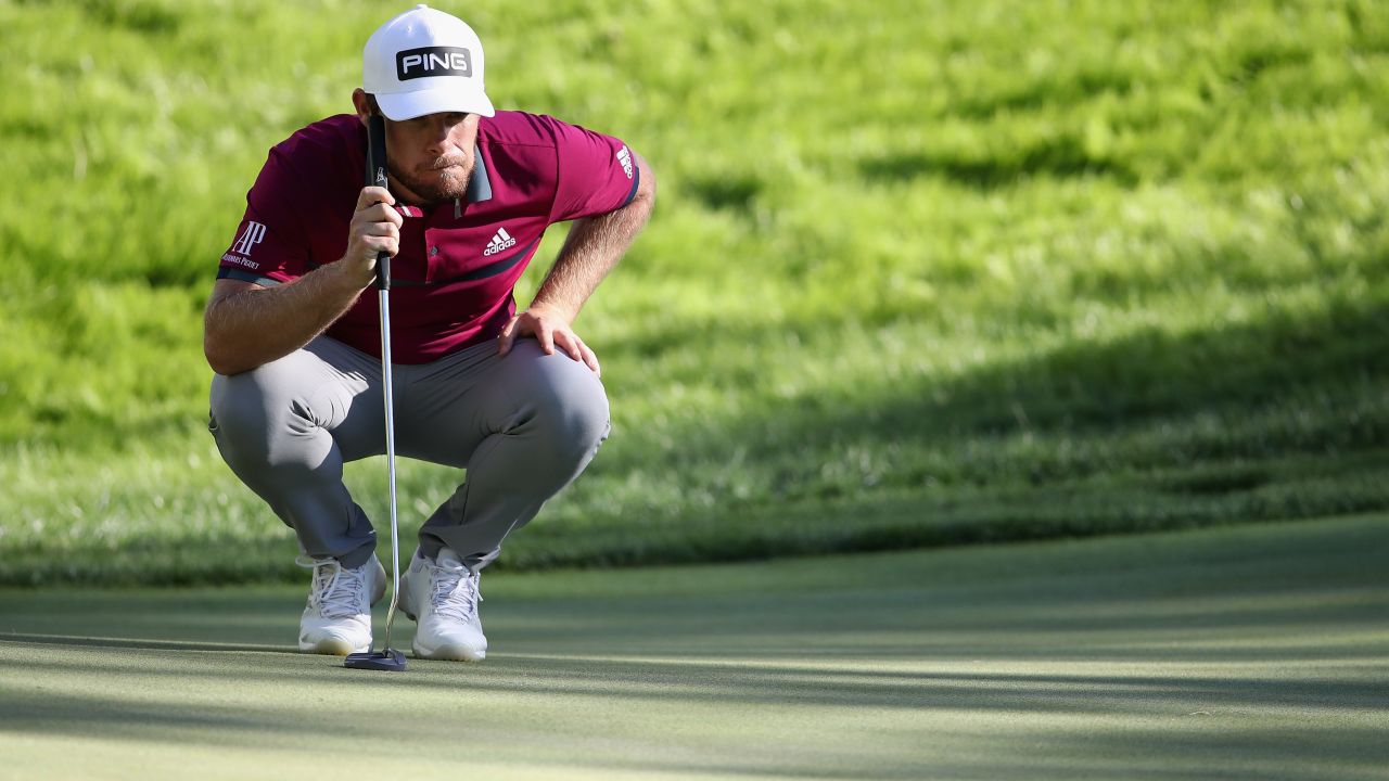 Hatton looks to putt on the eighth green during the CJ Cup.