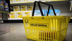 A shopping basket sits on the floor inside a Dollar General Corp. store in Chicago, Illinois, U.S., on Wednesday, Nov. 29, 2017. Dollar General is scheduled to release earnings figures on December 7. Photographer: Christopher Dilts/Bloomberg via Getty Images