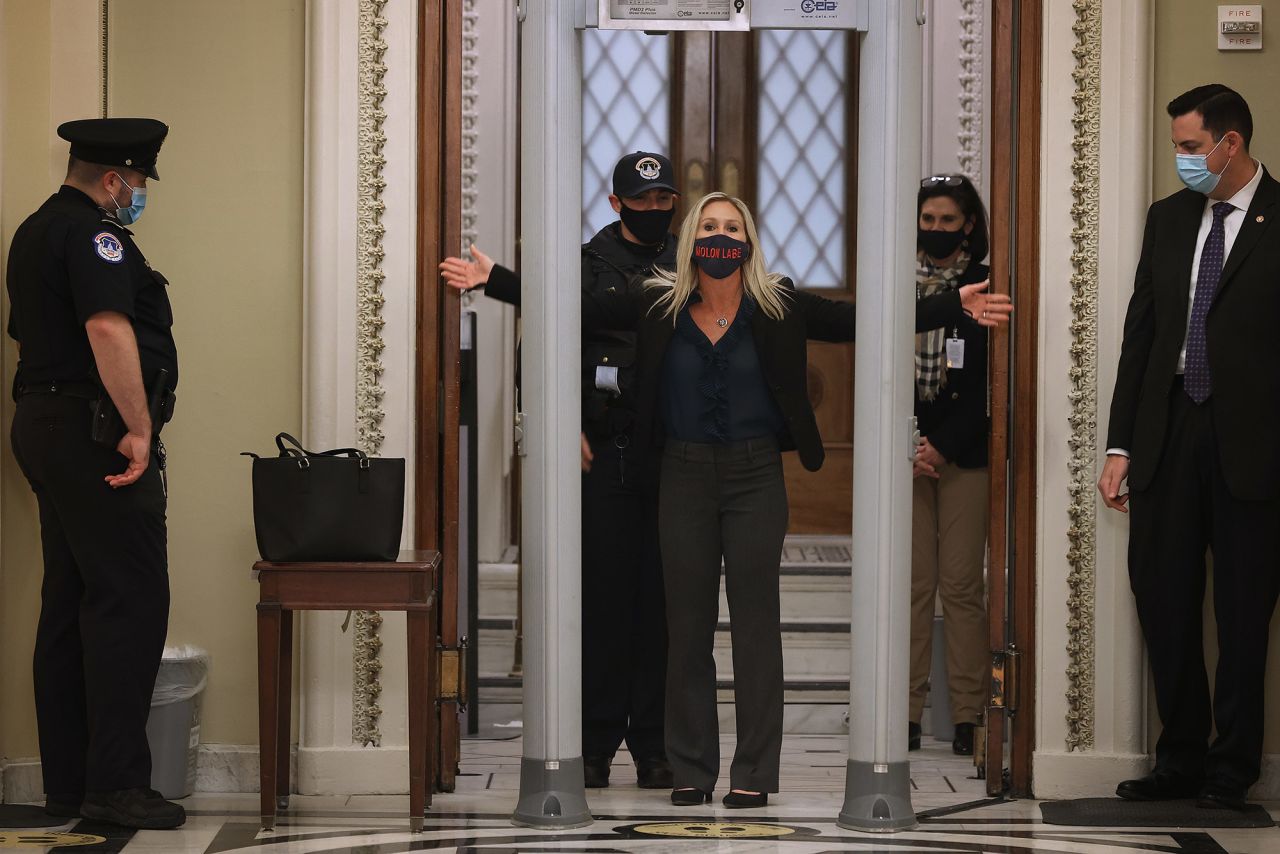 US Rep. Marjorie Taylor Greene, a Republican from Georgia, goes through a metal detector set up inside the Capitol on January 12.