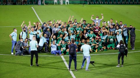 Chapecoense players celebrate their promotion to Serie A.