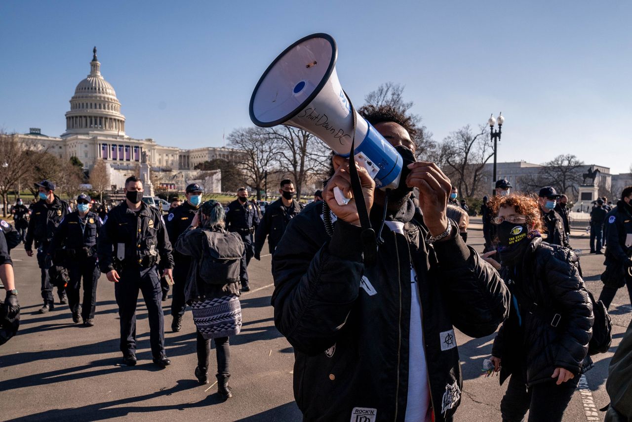 Shutdown DC activists in favor of impeaching Trump demonstrate outside the Capitol on January 13. The group had a banner that read "Expel all fascists."