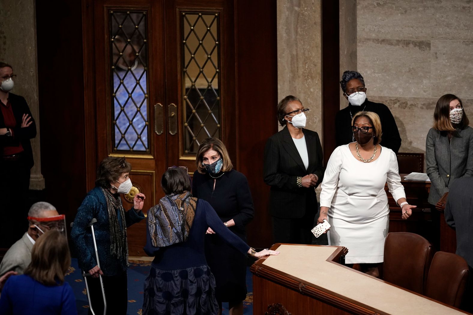 Pelosi speaks with US Rep. Rosa DeLauro, a Democrat from Connecticut, on January 13.