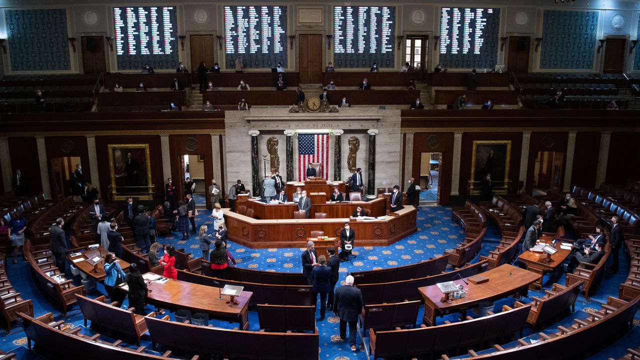 Speaker Nancy Pelosi presides over the House of Representatives as they conclude the vote to impeach on January 13.